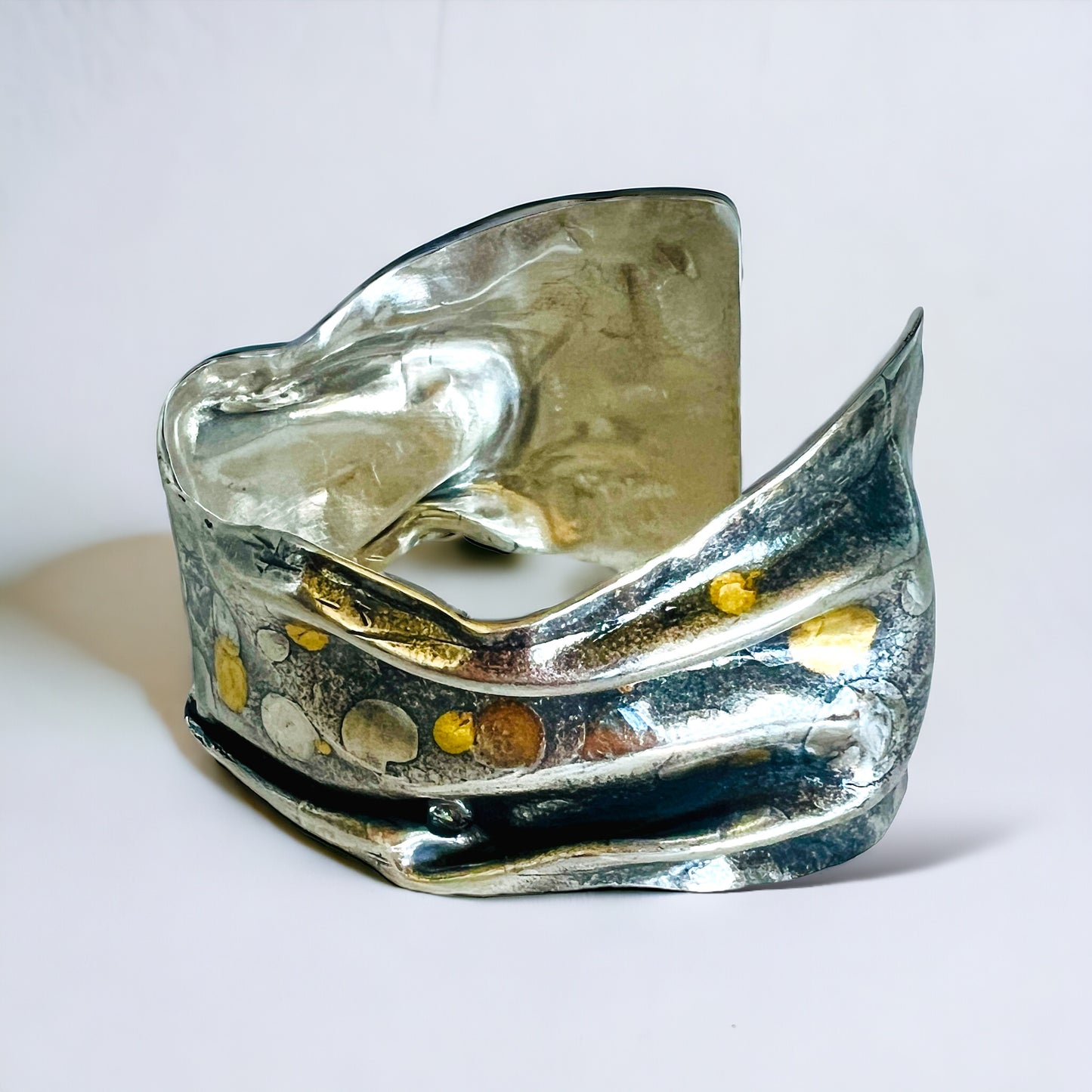 "Dots and Folds"...sterling silver and 24K gold cuff