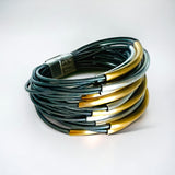 Multi-strand leather and stainless bracelet with 24K gold accents