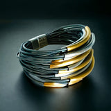 Multi-strand leather and stainless bracelet with 24K gold accents