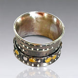 Sterling silver modern spinner ring size 6 with 24k gold accents