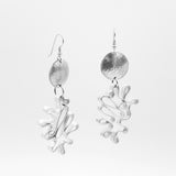 Modern flower earrings. Contemporary and lightweight statement earrings in silver.  Unique and fun to wear!