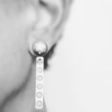 Polka dot long dangle post earrings.