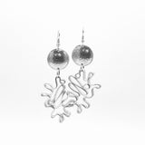 Modern flower earrings. Contemporary and lightweight statement earrings in silver.  Unique and fun to wear!
