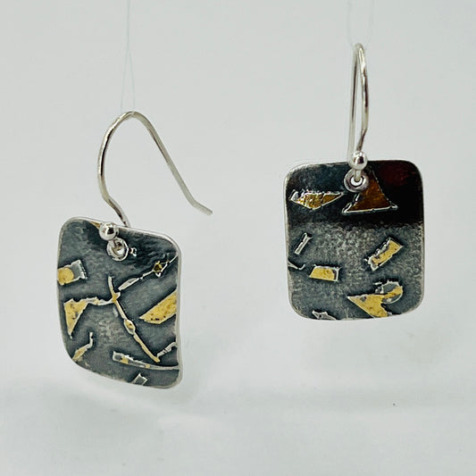 Deeply oxidized sterling silver and 24K gold combine in these small rectangle shape dangle earrings...modern, one of a kind.