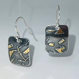 Deeply oxidized sterling silver and 24K gold combine in these small rectangle shape dangle earrings...modern, one of a kind.