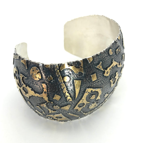 24K gold accents on deeply textured sterling silver cuff