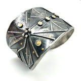 Bold statement cuff bracelet with an Art Deco Vibe!   24K gold accents on deeply textured cuff bracelet commands attention!