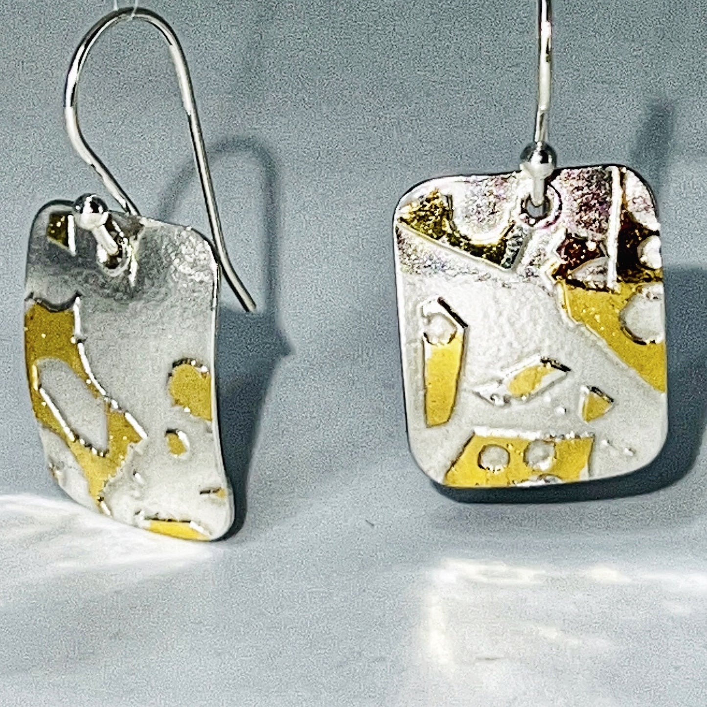 The earrings have been gently domed, adding to the overall design and along with their dangle design allow for movement and a gentle sway as your head moves.
