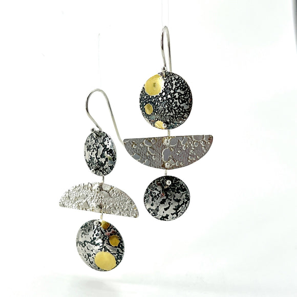 Deeply textured one -of-a-kind acid etched sterling silver asymmetrical dangle earrings with 24K gold accents.