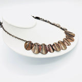 Fold-formed copper/sterling silver necklace.  Modern as well as boho, organic vibe.  Coordinating pieces available