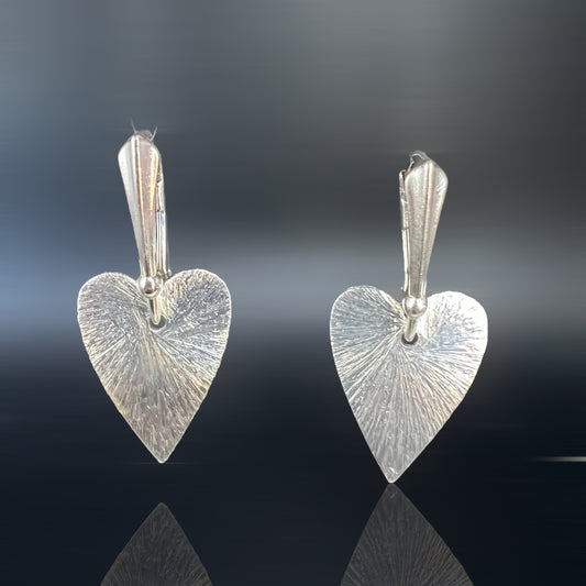 Delicate heart shape lever back dangles in silver
