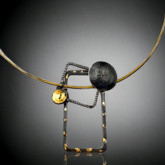 Bold and geometric....steel necklace with 24K gold