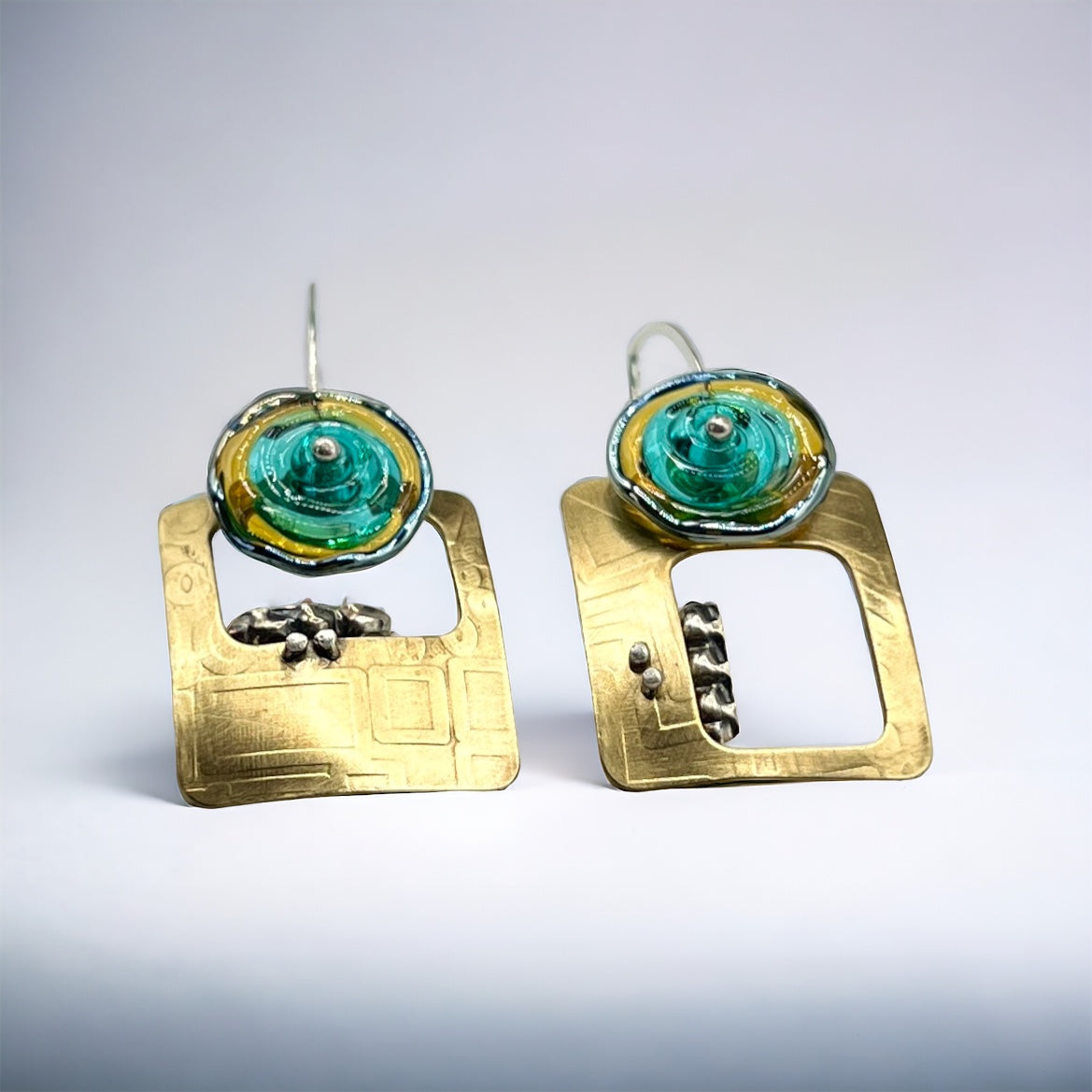 Contemporary brass, sterling silver and lamp work glass earrings