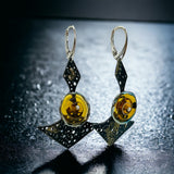 Dark starry night steel dangles black, 22K gold, amber glass