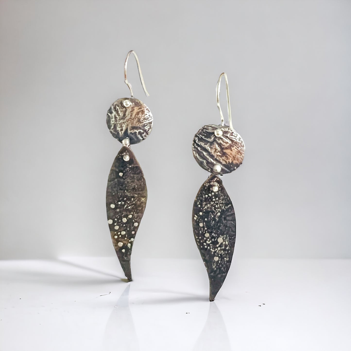 Starry night leaf shape contemporary steel textured dangles
