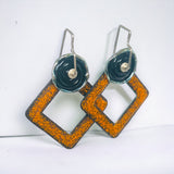 Geometric Enamel dangle earrings in orange, black