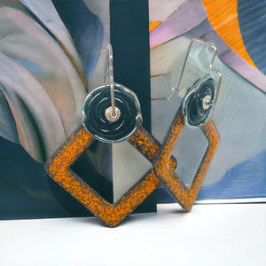 Geometric Enamel dangle earrings in orange, black