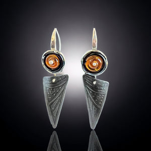 Elegant and edgy sterling silver, steel/iron and amber glass dangles