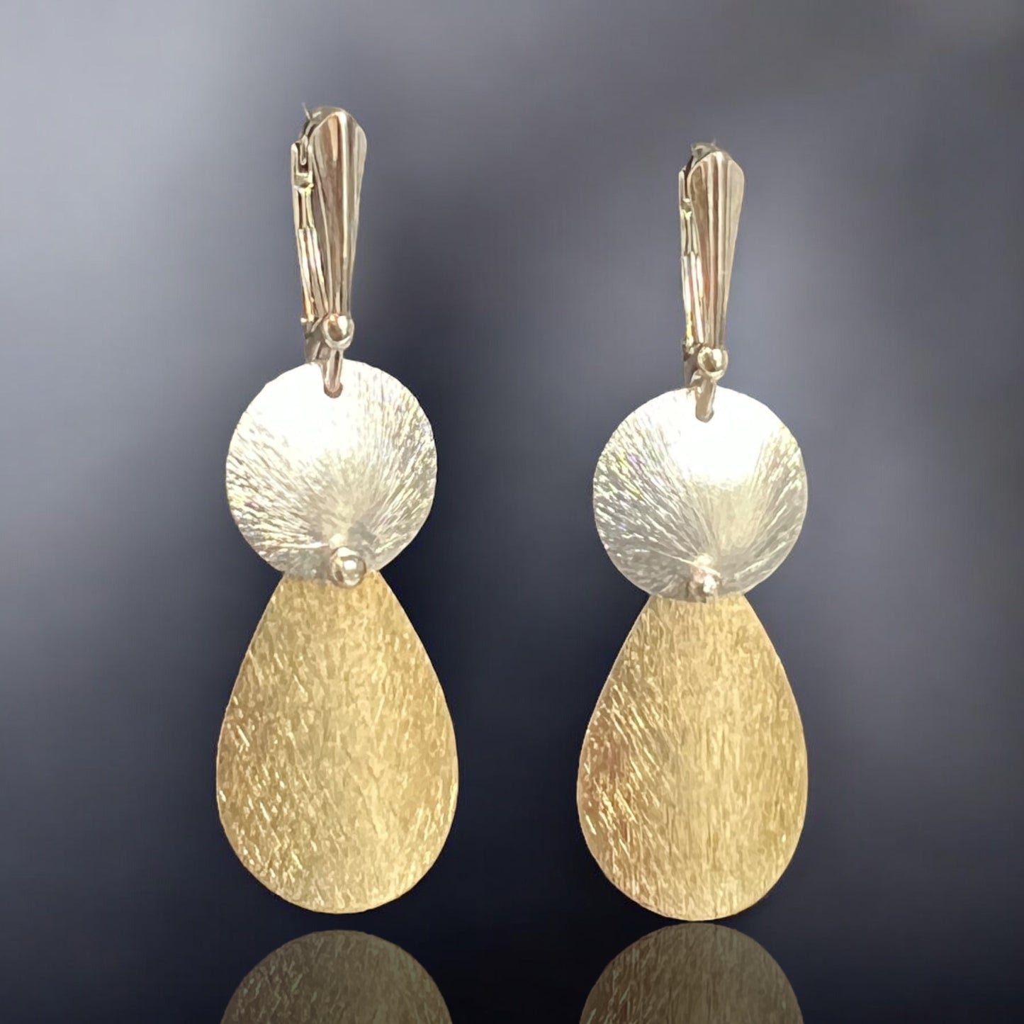 Kinetic teardrop and circle dangle earrings beautifully textured and riveted in gold and silver