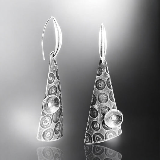 "Will it Go 'Round in Circles"....contemporary steel, sterling silver dangles