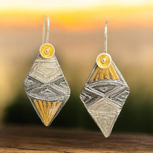 Contemporary steel and 24K gold dangle earrings, flattering asymmetrical design