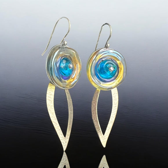 Statement dangles with blue and yellow glass, gold leaf forms