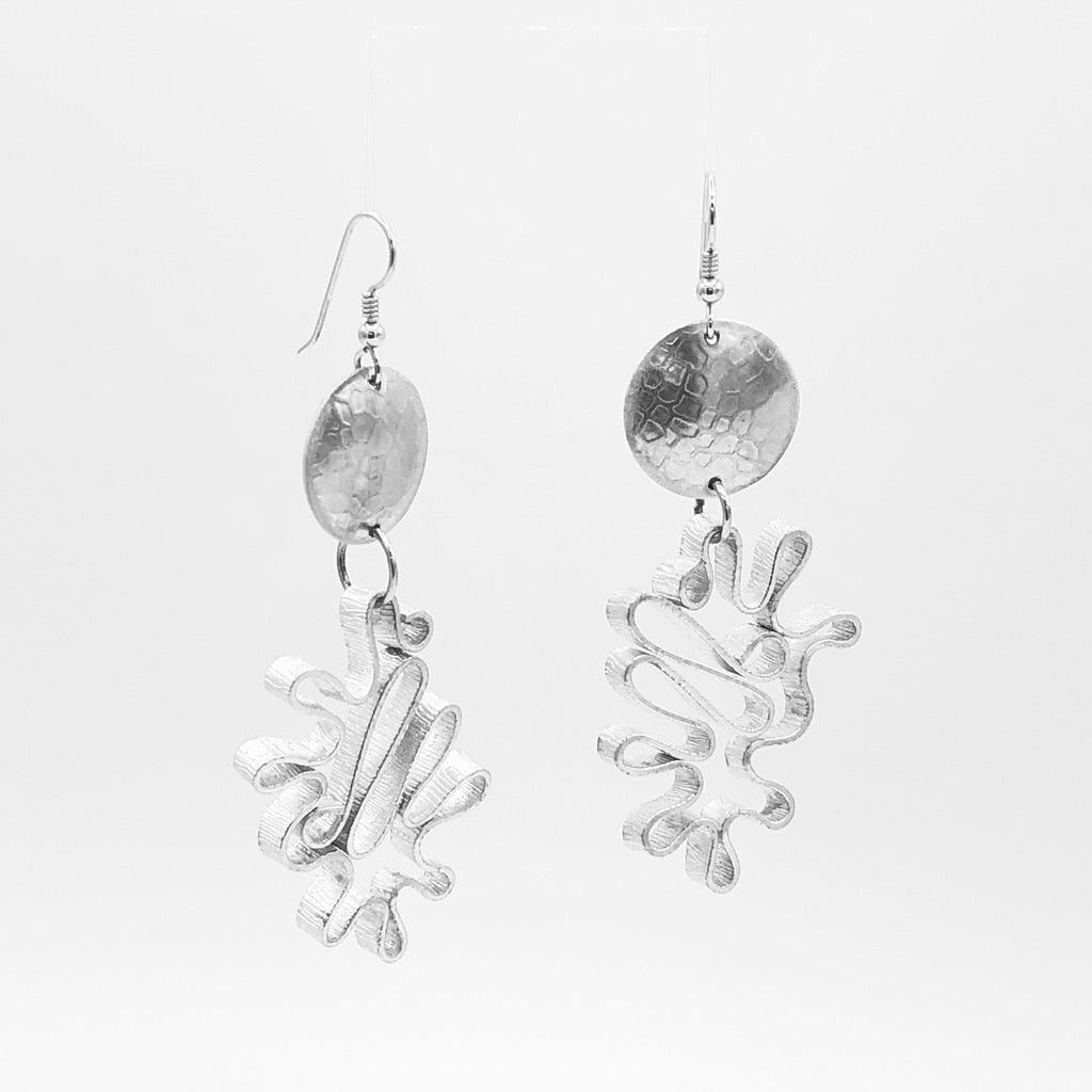 Modern flower earrings. Contemporary and lightweight statement earrings in silver.  Unique and fun to wear!