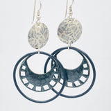 Animal/reptile pattern hoop earrings. Rubber, enamel, and sterling silver play beautifully together!