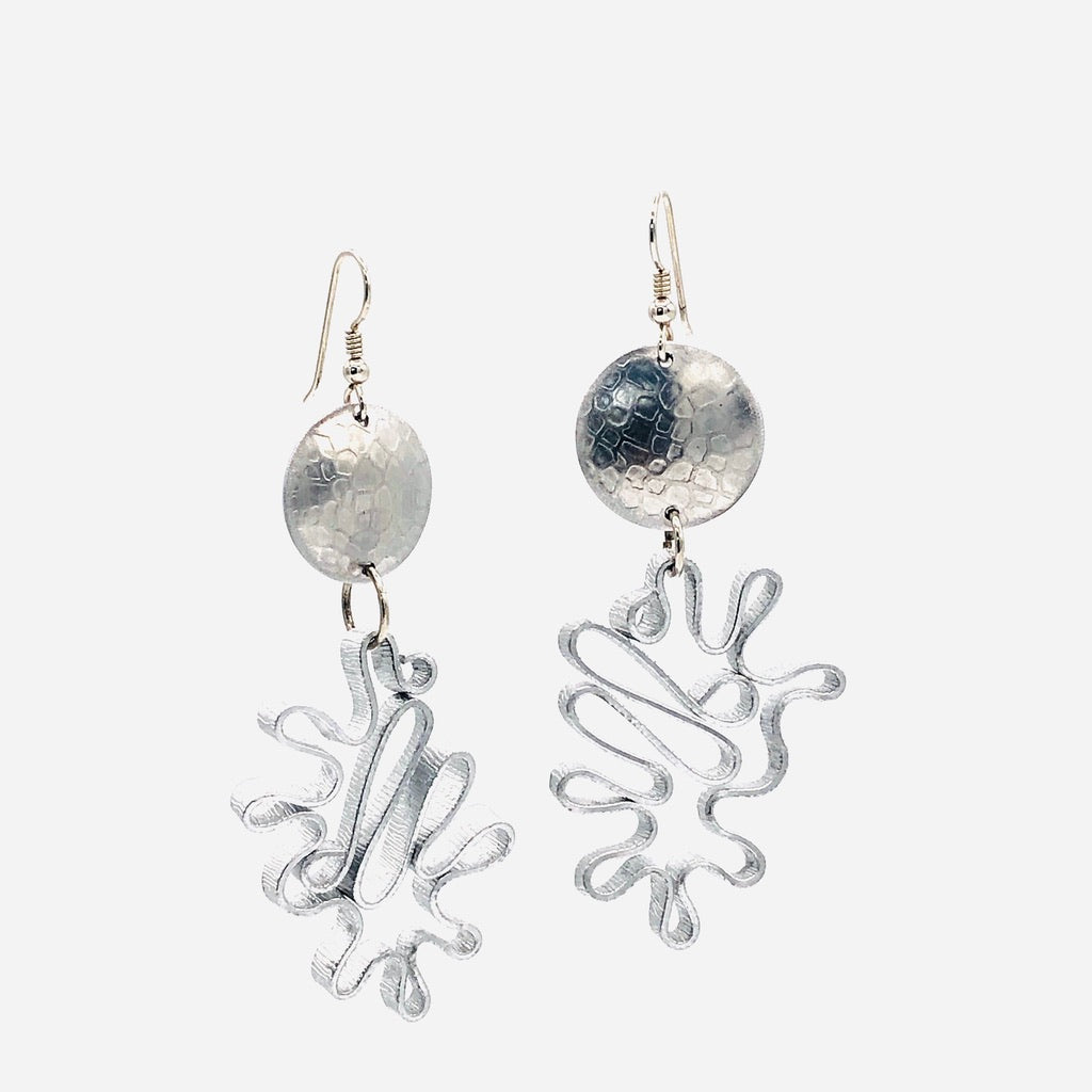 Modern flower earrings. Contemporary and lightweight statement earrings in silver.  Unique and fun to wear!
