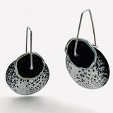 One of a kind Black and white speckled design enamel earrings with black lamp work glass bead, sterling silver ear wires.