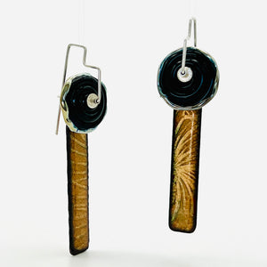 Black and gold handmade and textured one of a kind dangle earrings with sterling silver ear wires.