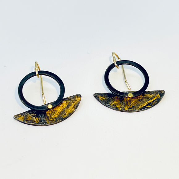 Dramatic but minimalist steel and gold dangle earrings