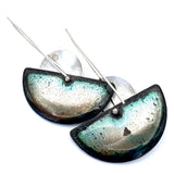 The enamel on the back of these earrings is a gorgeous palette of iridescent colors to include golden shades and as well as greens,  framed in with a black edge.