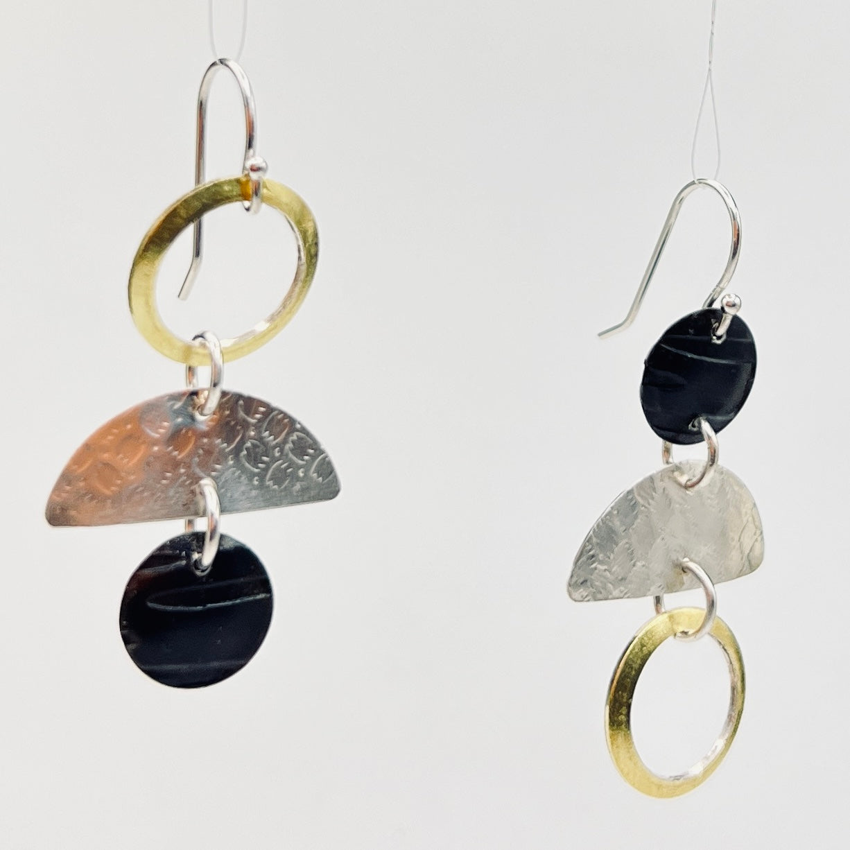 "Asymmetrical Mini"....steel, 24K gold, sterling silver dangles