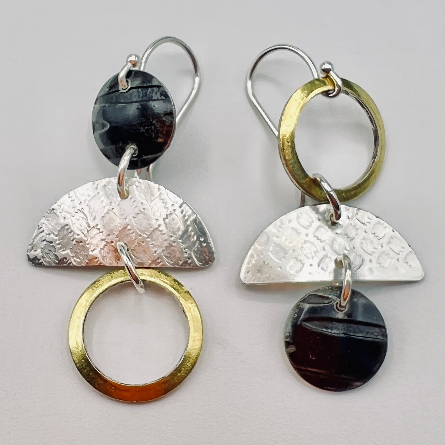 "Asymmetrical Mini"....steel, 24K gold, sterling silver dangles