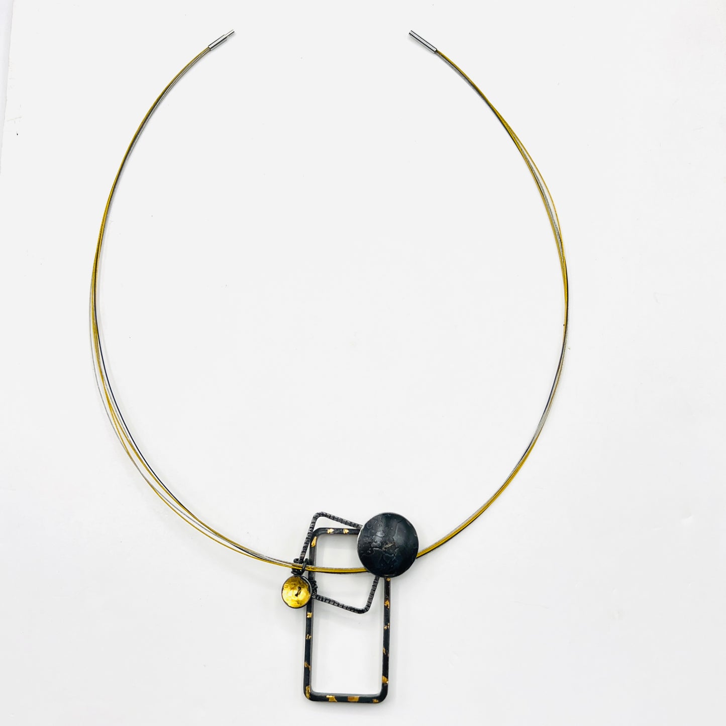 Bold and geometric....steel necklace with 24K gold