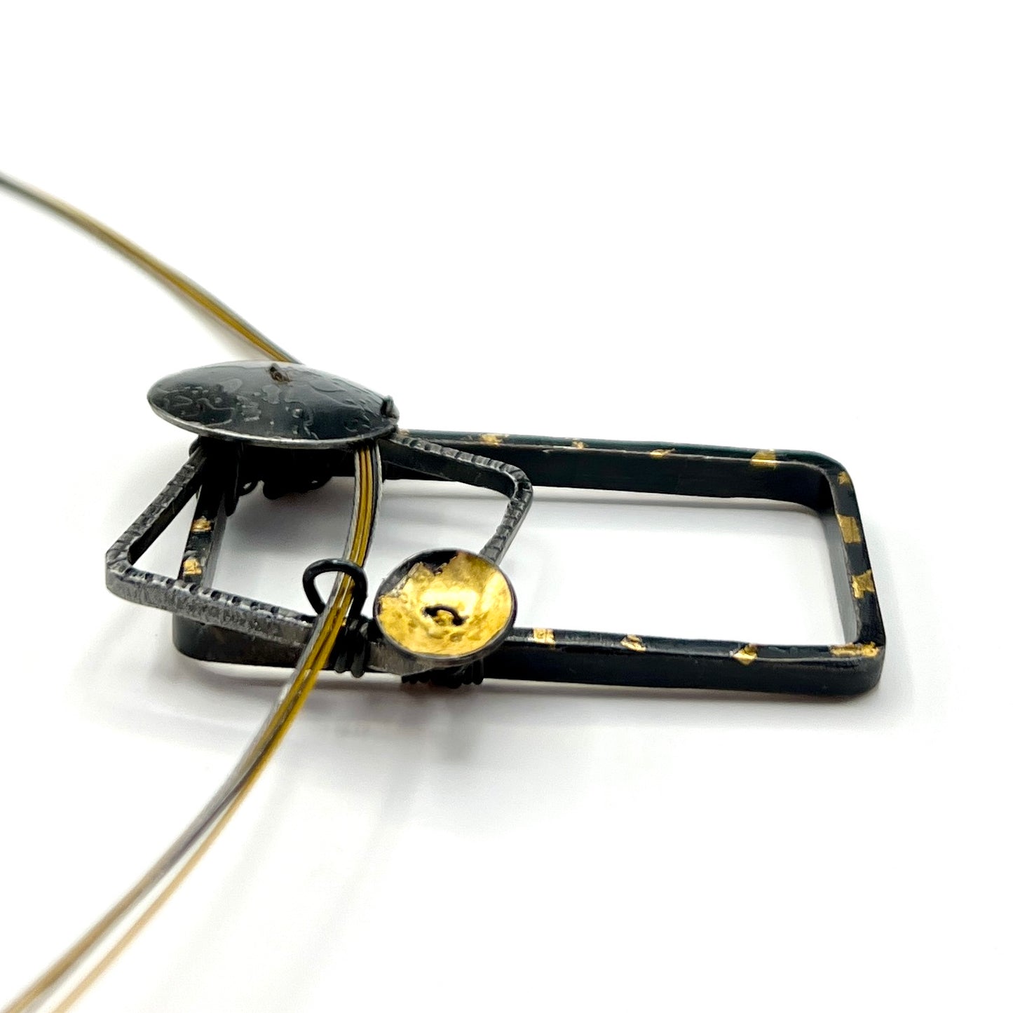 Bold and geometric....steel necklace with 24K gold
