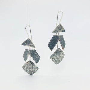 Sterling silver contemporary dangle earrings.