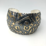 24K gold accents on deeply textured sterling silver cuff