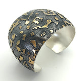 24K gold accents on deeply textured sterling silver cuff