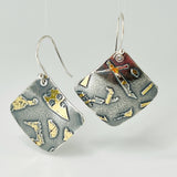 Deeply oxidized sterling silver and 24K gold combine in these square shape dangle earrings hung on diagonal