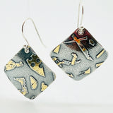 Deeply oxidized sterling silver and 24K gold combine in these square shape dangle earrings hung on diagonal