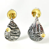 Diana's Artful Handmade statement Jewelry is architectural, modern, one of a kind, sophisticated and bold!