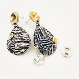 Diana's Artful Handmade statement Jewelry is architectural, modern, one of a kind, sophisticated and bold!