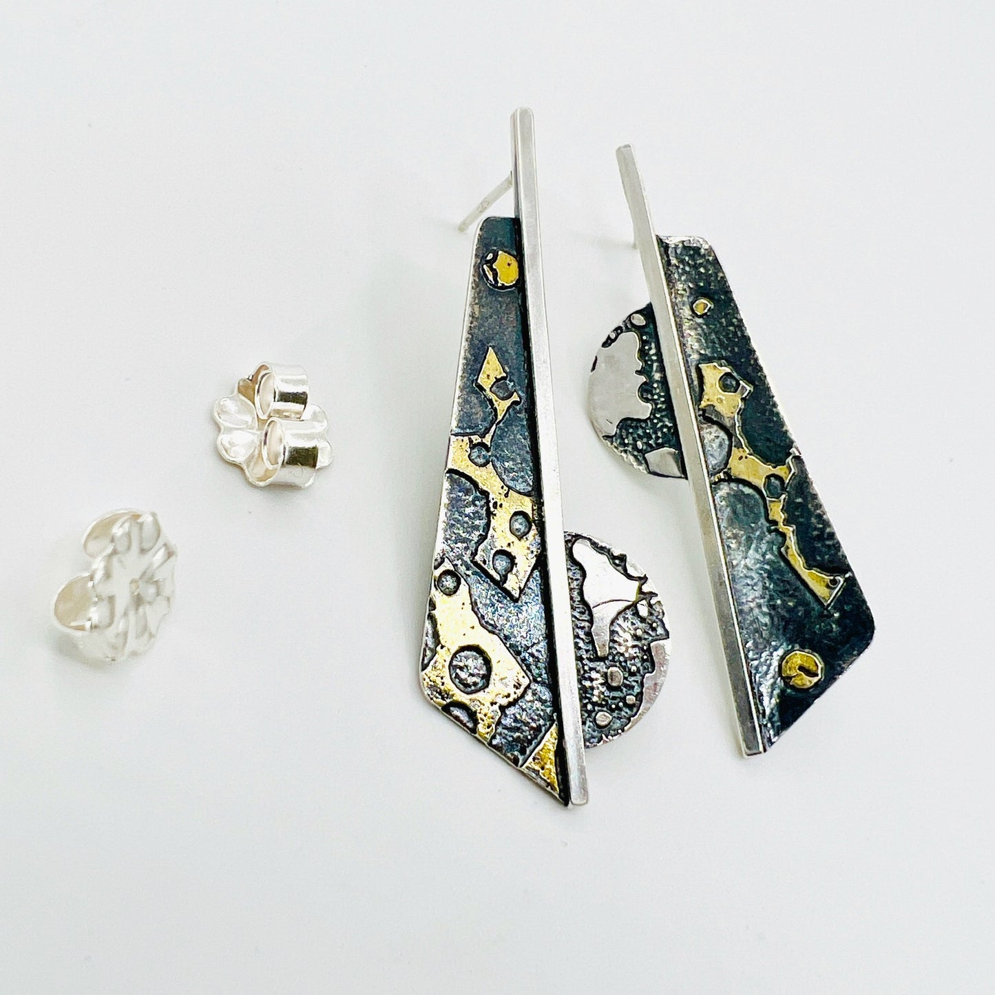 Handmade, one of a kind bold, contemporary geometric post earrings are stunning!  Oxidized sterling silver and 24k gold.