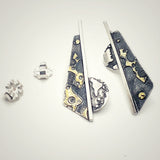 Handmade, one of a kind bold, contemporary geometric post earrings are stunning! Oxidized sterling silver and 24k gold.