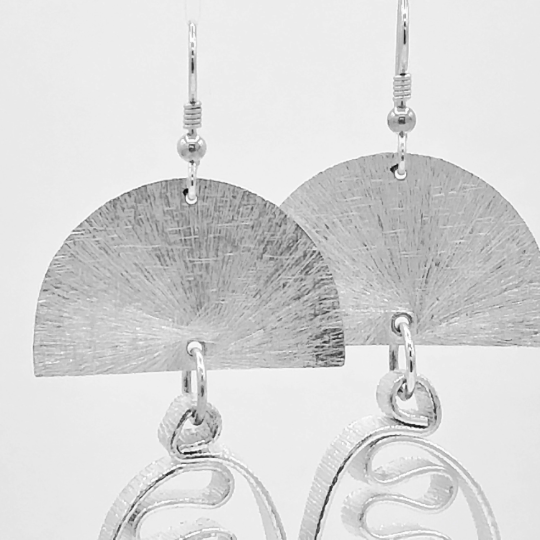 Bold statement earrings in silver aluminum
