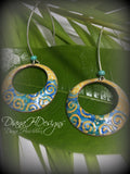 Geometric open hoop earrings are retro as well as modern.  Yellow, blue, green vitreous enamel.