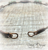 Copper and shell choker necklace.  Comfortable to wear, adjusts easily.  Green and bronze tones.