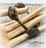 Copper and shell choker necklace.  Comfortable to wear, adjusts easily.  Green and bronze tones.